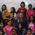 Gregg with songwriting workshop participants