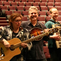Gregg and the Acoustic Orchestra during the sound check at the Brock University Centre for the Arts, St Catharines. From left to right: Suzie Vinnick, Steve Briggs, Steve Klodt, and a freakishly short-haired Gregg.  (Photo credit: Erin White)