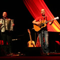 The Acoustic Orchestra during set two at the Brock University Centre for the Arts, St Catharines. From left to right: Steve Klodt, Gregg, Suzie Vinnick, Steve Briggs. (Photo credit: Erin White)